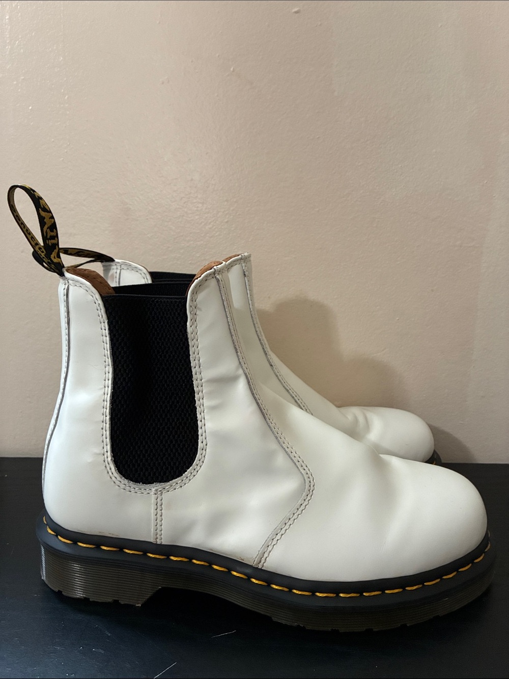 Dr. Martens 2976 Chelsea boots featuring a signature yellow size US7M US8L